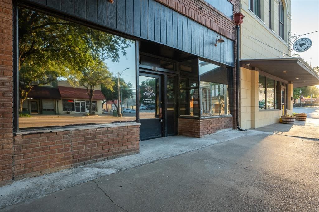 102 West Elm listing photo, storefront next to Branded Burger